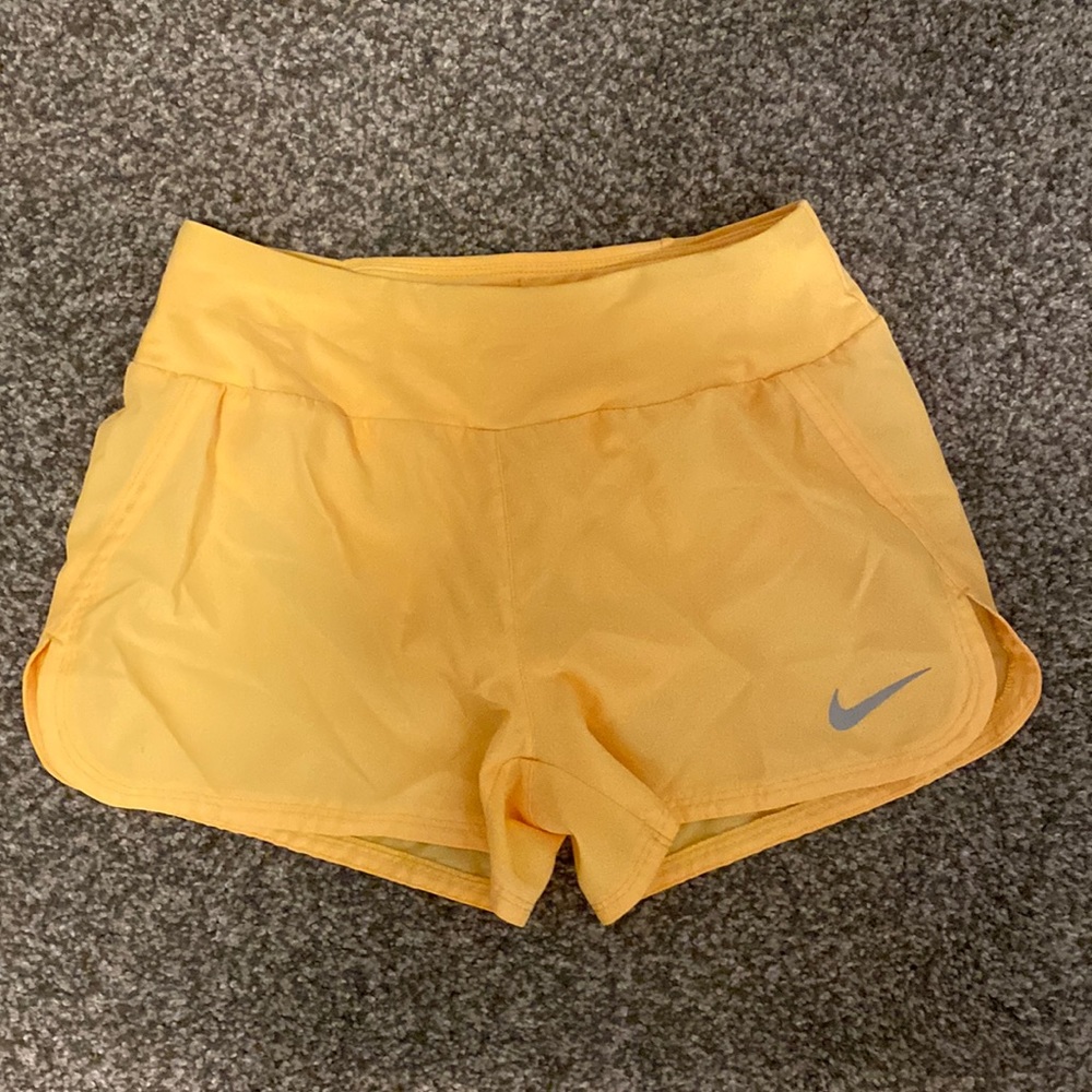 Nike bright orange athletic shorts
